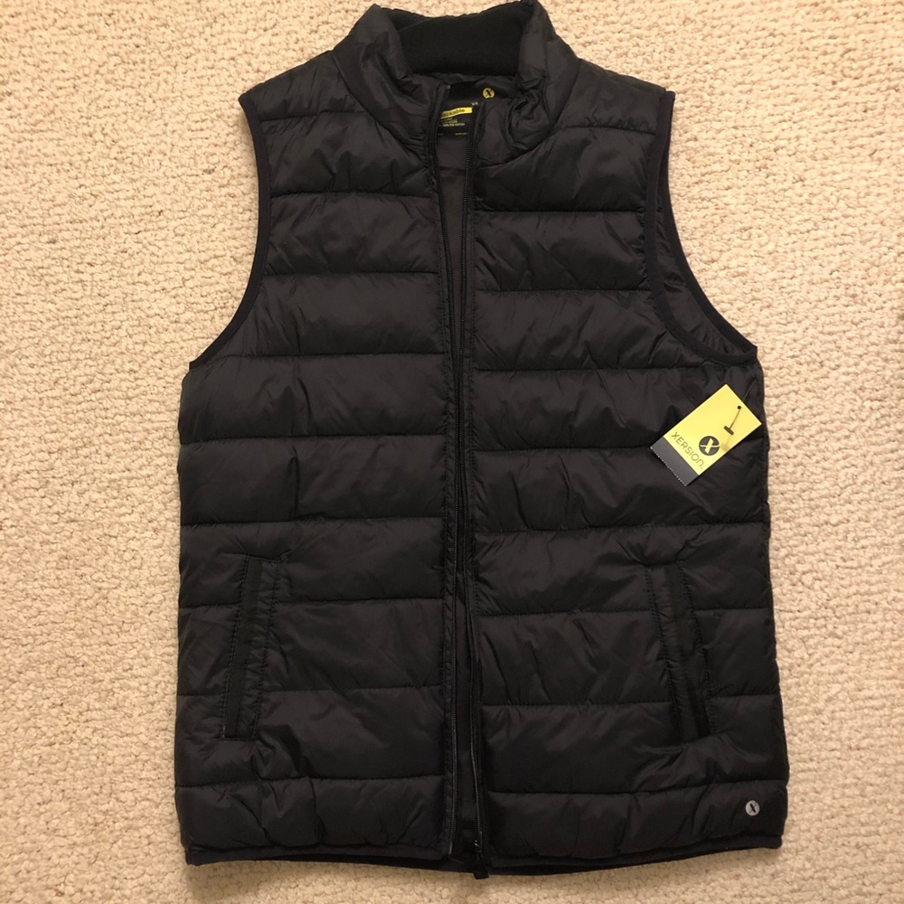 Black puffer vest. NWT